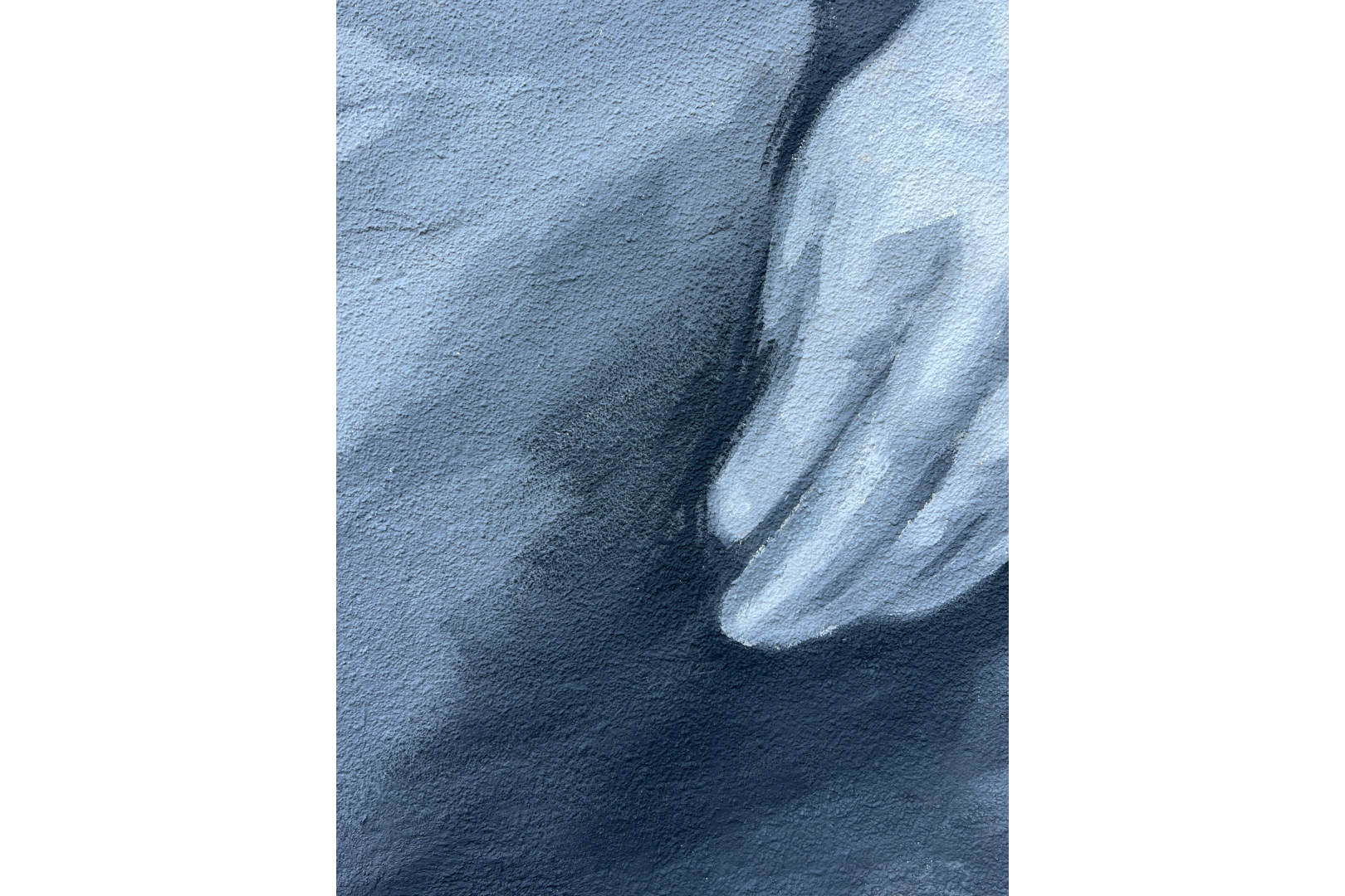 Fresque murale en noir et blanc sur une façade qui rend hommage à Marcel Rozard.